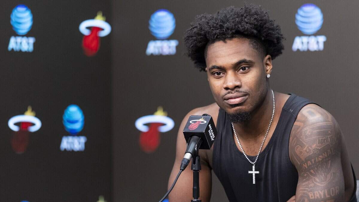 Miami Heat guard Davion Mitchell (45) participates in his team’s season-ending exit interviews at Kaseya Center on April 16, 2026, in Miami.